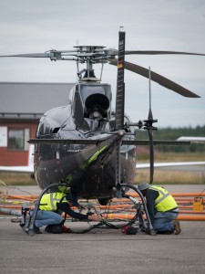 Geotech’s crew working on the mechanism to attach the VTEM™ system to the aircraft