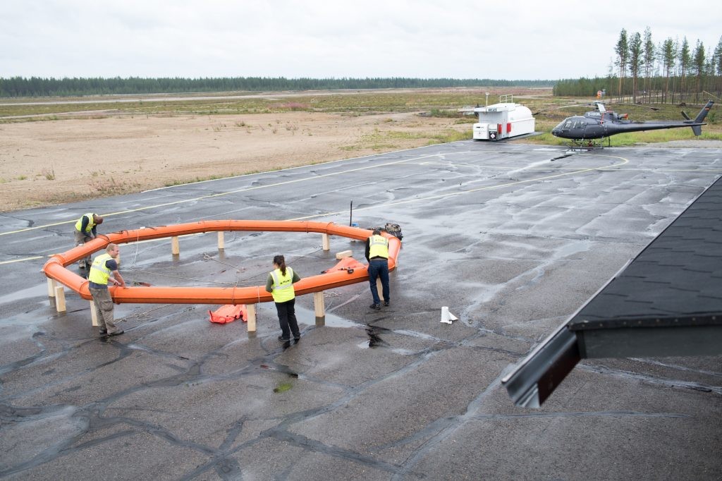 Geotech’s crew making sure the ZTEM™ system is dry after a night of rainstorms