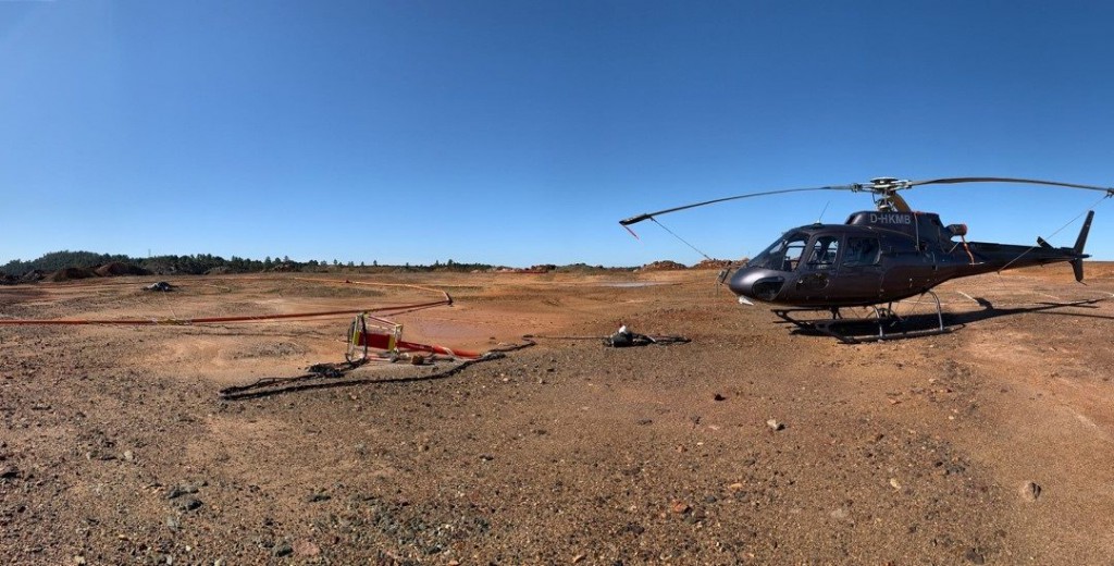 Helicopter on the ground with survey equipment