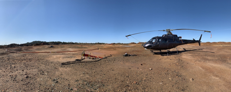 Helicopter on the ground with survey equipment